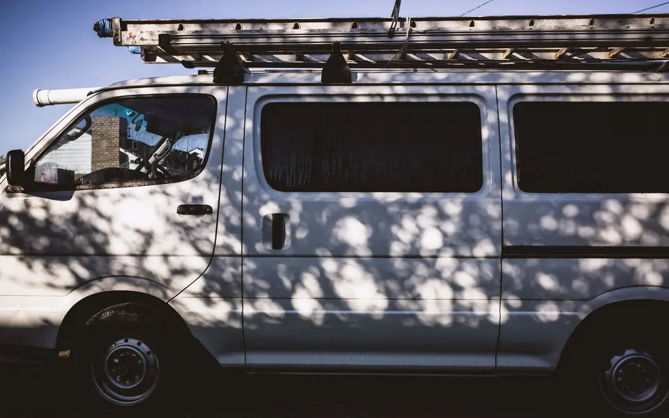 A Ladder on a White Van